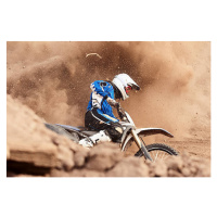 Fotografie Motocross biker taking a turn in the dirt., Daniel Milchev, 40x26.7 cm