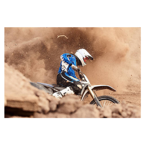 Fotografie Motocross biker taking a turn in the dirt., Daniel Milchev, 40 × 26.7 cm