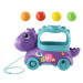 Fisher Price Hrající dino s vyskakujícími míči CZ/SK/ENG/HU/PL