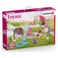 Schleich 42445 třpytivý květinový dům s jednorožci, jezerem a stájí