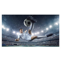 Fotografie Soccer player kicking ball in stadium, Dmytro Aksonov, 40x22.5 cm