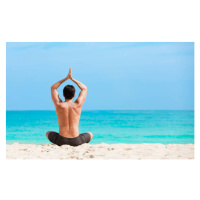 Fotografie Man meditating on the beach, kieferpix, 40 × 26.7 cm