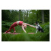 Fotografie Young woman practicing yoga in nature, IzaLysonArts / 500px, (40 x 26.7 cm)