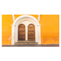 Fotografie Colorful facade and doors to old, Kryssia Campos, 40 × 22.2 cm