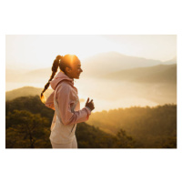 Fotografie Happy young woman running outdoors with, Oleg Breslavtsev, 40 × 26.7 cm