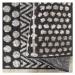 Designový koberec v šedé barvě s jemnými vzory