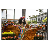 Fotografie Mid adult woman dancing and celebrating, FG Trade Latin, 40 × 26.7 cm