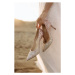 Fotografie Luxurious high-heeled shoes in the bride's, DAMIENPHOTO, (26.7 x 40 cm)