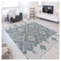 Skandinávský koberec s mátově zelenými vzory