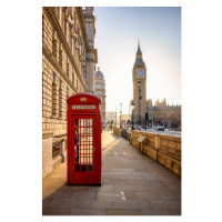 Fotografie A classic, red telephone booth in, SHansche, 26.7 × 40 cm