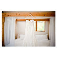 Fotografie Wedding dress hanging bed, Cavan Images, 40 × 26.7 cm