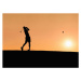 Fotografie Golf player hitting the perfect pitch at sunset, Jasmin Merdan, 40 × 30 cm