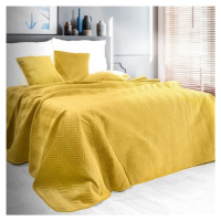 Oboustranný prošívaný přehoz na postel žluté barvy Šířka: 220 cm | Délka: 240 cm.