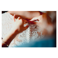 Fotografie Close-up of a bridesmaid buttoning up, corinafotografia, 40x26.7 cm