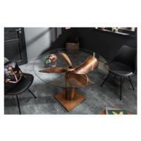 Estila Industriální bronzový jídelní stůl Helic ve tvaru lodního šroubu s kulatou deskou ze skla