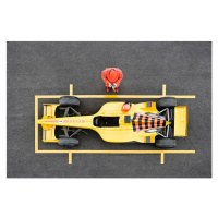 Fotografie Racecar Driver Standing by Racecar Adjusting, David Madison, 40 × 26.7 cm