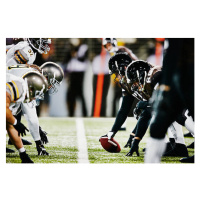 Fotografie Football teams on line of scrimmage in stadium, Thomas Barwick, 40 × 26.7 cm