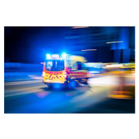 Fotografie Ambulance circulating the streets at night,, Wirestock, 40x26.7 cm