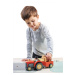 Dřevěný traktor s vlečkou Farmyard Tractor Tender Leaf Toys s figurkou farmáře a zvířátky od 18 