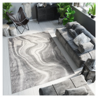 Světle šedý designový koberec s abstraktním vzorem