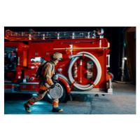 Fotografie Firefighter running with a hose next, Trevor Williams, 40x26.7 cm