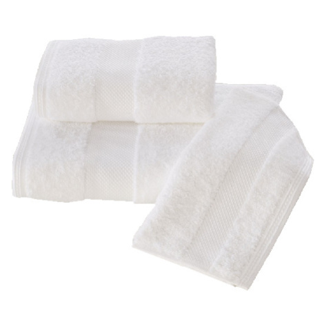 Bílé ručníky a osušky