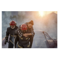 Fotografie Firefighters rescue a woman, carrying her, boonchai wedmakawand, 40 × 26.7 cm