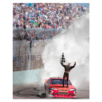 Fotografie Winning driver standing on hood of race car., Jon Feingersh, 30 × 40 cm