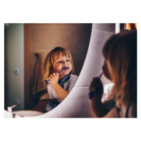Fotografie sweet young boy is brushing teeth, StockPlanets, 40x30 cm