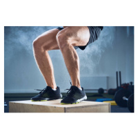 Fotografie Closeup of man doing box jump exercise at gym, Westend61, 40x26.7 cm