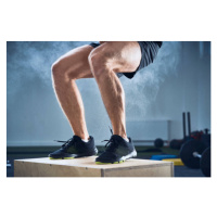 Fotografie Closeup of man doing box jump exercise at gym, Westend61, 40 × 26.7 cm