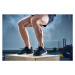 Fotografie Closeup of man doing box jump exercise at gym, Westend61, 40 × 26.7 cm