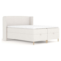 Krémová boxspring postel s úložným prostorem 160x200 cm Monpelli – Maison de Rêve