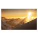 Fotografie Climbers on a snowy ridge at sunrise, Buena Vista Images, 40 × 24.1 cm