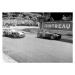 Fotografie Stiriling Moss in the mercedes and Eugenio Castellotti driving the lancia d50 passing