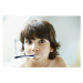 Fotografie Portrait of boy (7-9) brushing teeth, Oliver Rossi, 40 × 26.7 cm