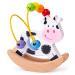 Bigjigs Toys Motorický labyrint houpačka COW