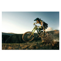 Fotografie Female biker jumping on her mountain bike., Daniel Milchev, (40 x 26.7 cm)