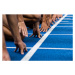 Fotografie Track sprinters lined up at starting, Michael H, 40 × 26.7 cm