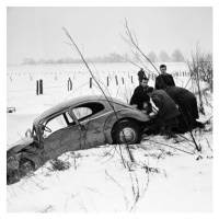 Fotografie A Volkswagen beetle had an accident and was found in the roadside ditch, Germany 1960