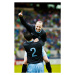 Fotografie Soccer player jumping into the arms of teammate, Thomas Barwick, 26.7 × 40 cm