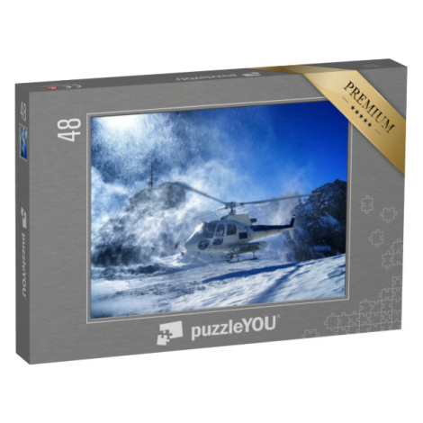 puzzle 48 dílků „Záběr skupiny freeriderů z vrtulníku“