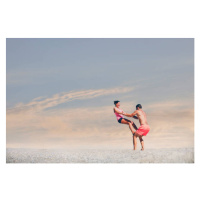 Fotografie Young sporty couple practicing acroyoga exercises, Sergio Lacueva, 40 × 26.7 cm