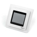 Pokojový termostat DEVIreg Touch 140F1071 rámečkem polar