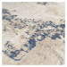 Nádherný moderní koberec v béžové barvě s modrým detailem