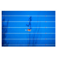 Fotografie Top view of female runner on tartan track, Westend61, 40 × 26.7 cm