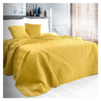 Oboustranný prošívaný přehoz na postel žluté barvy