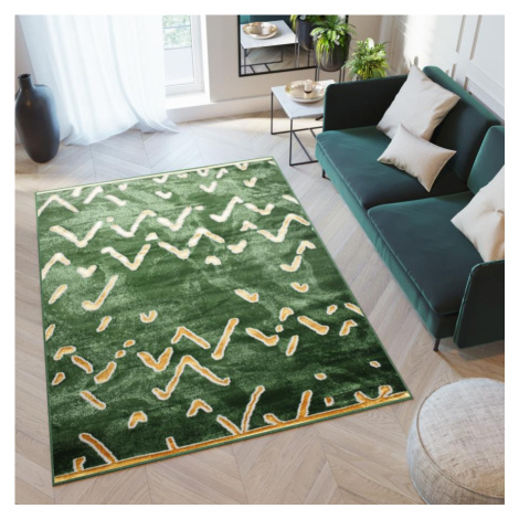 Moderní zelený koberec se vzorem