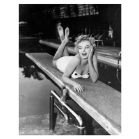 Fotografie Marilyn Monroe lying on a springboard in California, 1953, 30x40 cm