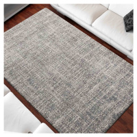 Kvalitní šedý koberec v módním designu